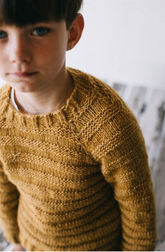 Basic Sweater junior passer både til piger og drenge. 